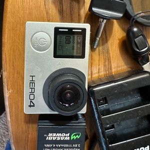 GoPro Hero 4 with lots of accessories.
